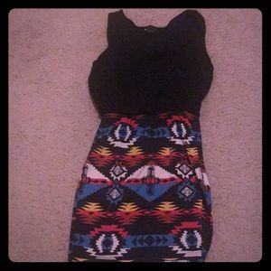 It is a black bodycon dress that you wear for fall